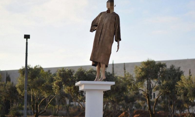  Golden Statue Of Chief Justice Miriam Neor Placed In Front Of High Court