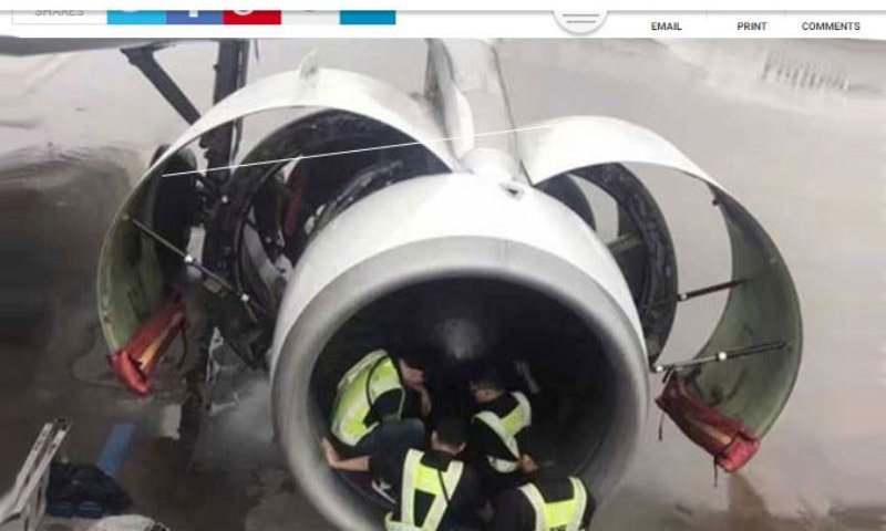 צוות המטוס בודק את המנוע. צילומסך: אתר NDTV