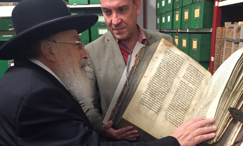 Rabbi Elituv with ancient Bible (courtesy of photographer)