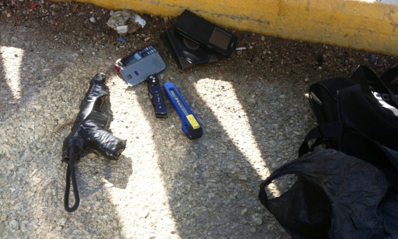 הנשק שהתגלה על גופם, צילום: דובר המשטרה