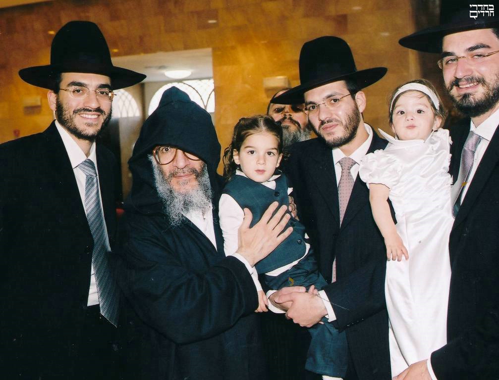 הרב עם ילדיו. צילם באדיבות: משפחה